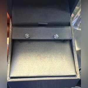 Authentic Diamond Stud Earrings .40 total weight. In white gold.